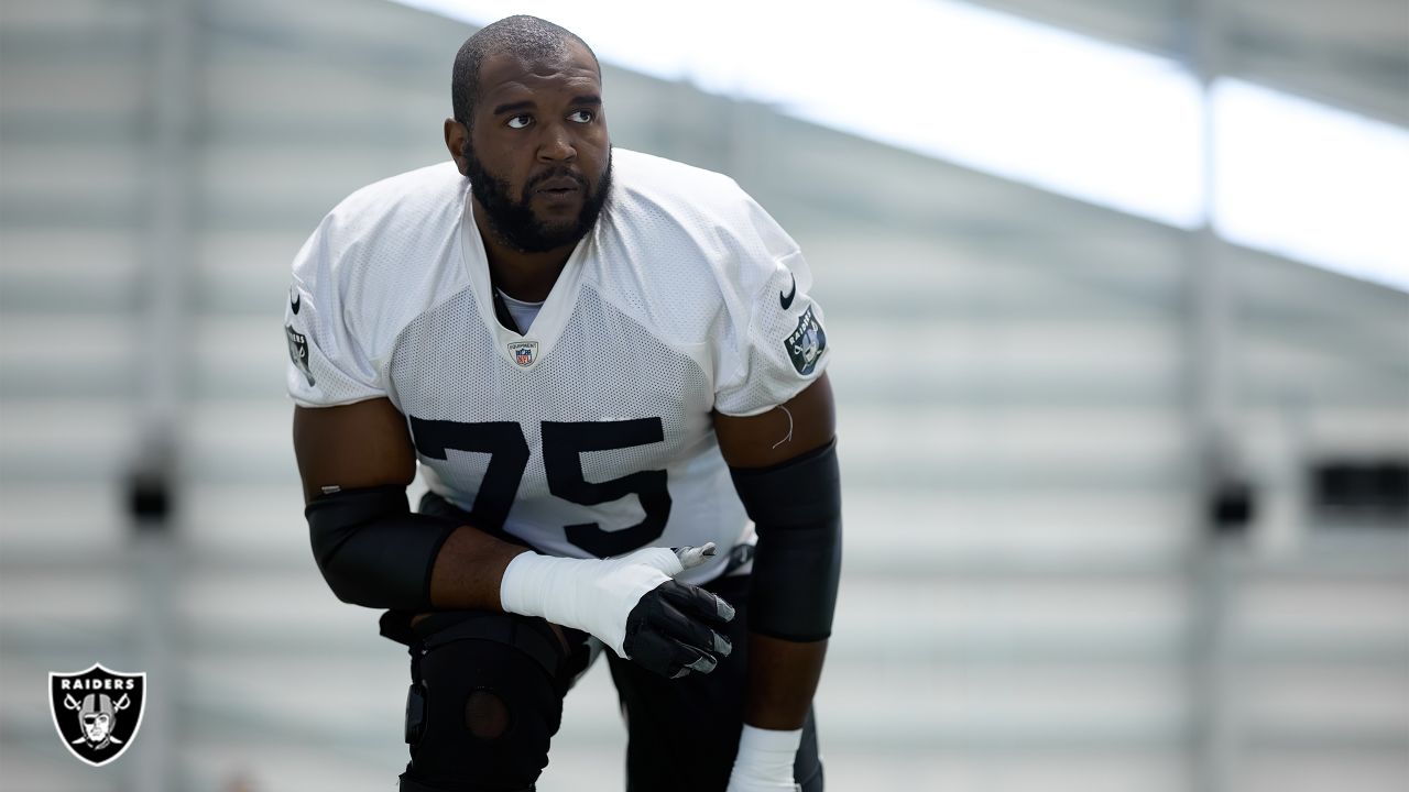 Oakland Raiders offensive tackle Brandon Parker (75) watches