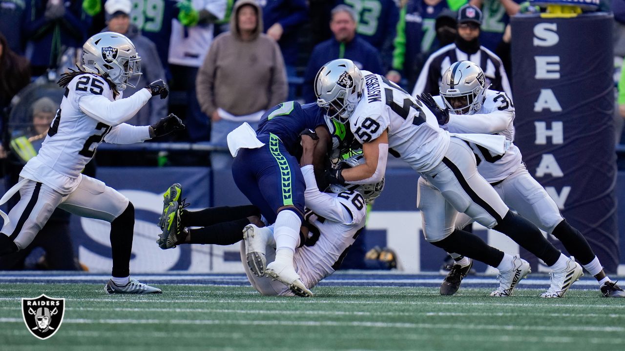 Indianapolis, Indiana, USA. 02nd Jan, 2022. Las Vegas Raiders running back  Josh Jacobs (28) runs with the ball as Indianapolis Colts defensive back  Rock Ya-Sin (26) attempts to make the tackle during