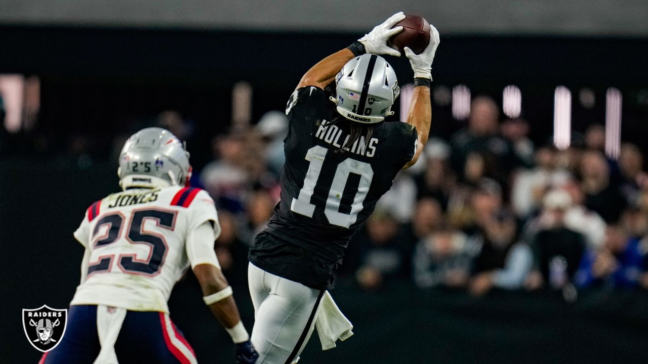 The Las Vegas Raiders, left, face off at the line of scrimmage against the  New England Patriots in the first half of an NFL football game, Sunday,  Sept. 27, 2020, in Foxborough