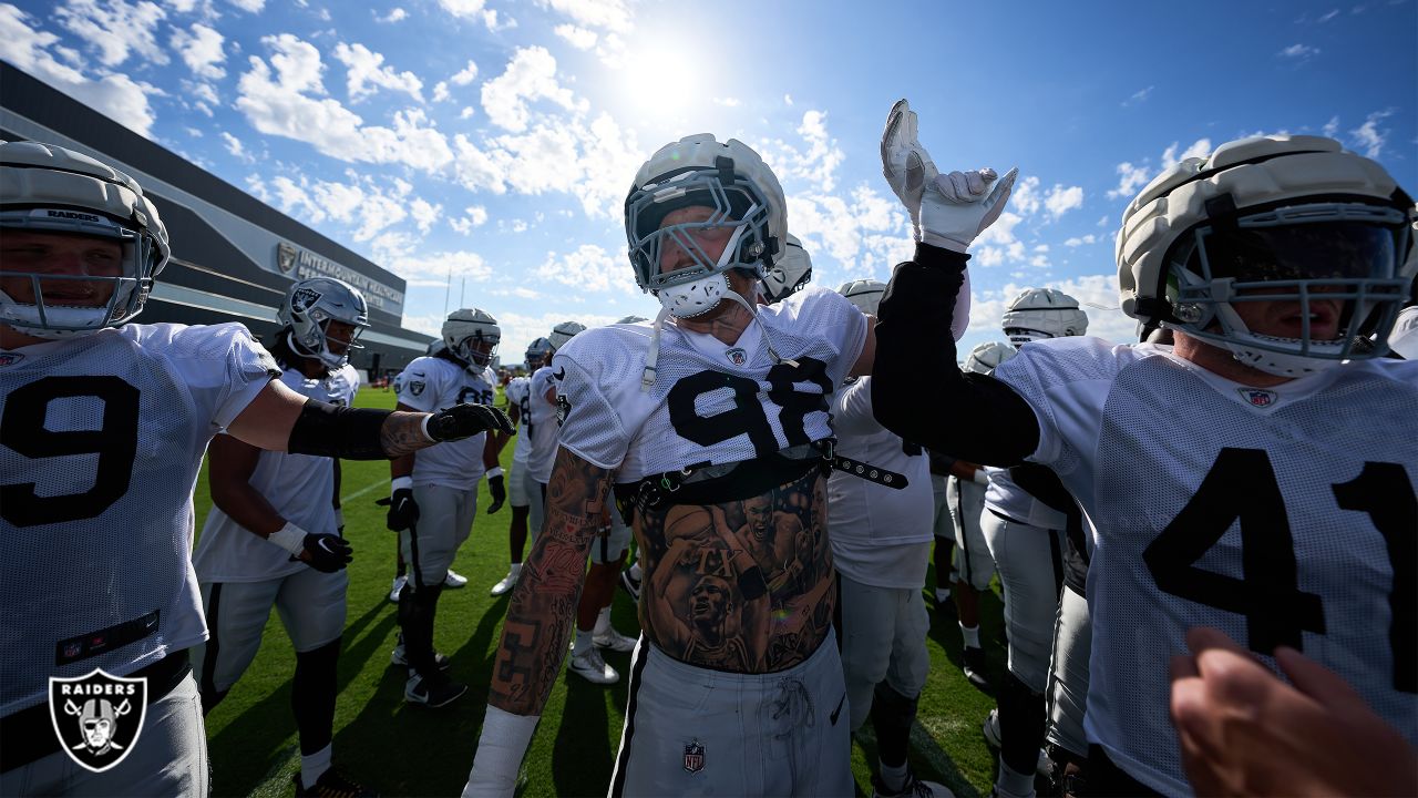 Las Vegas Raiders defensive end Maxx Crosby (98) and Las Vegas Raiders  defensive tackle John Jenkins (95) celebrate a play against the Denver  Broncos of an NFL football game Sunday August 10