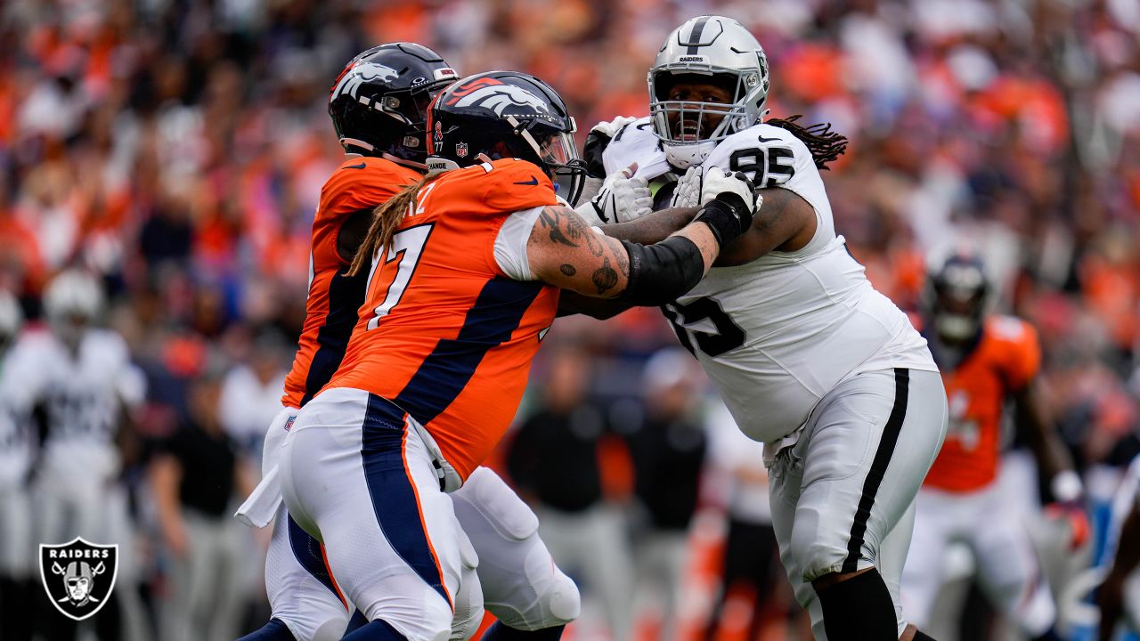 Oakland Raiders players during a match against the Denver Broncos