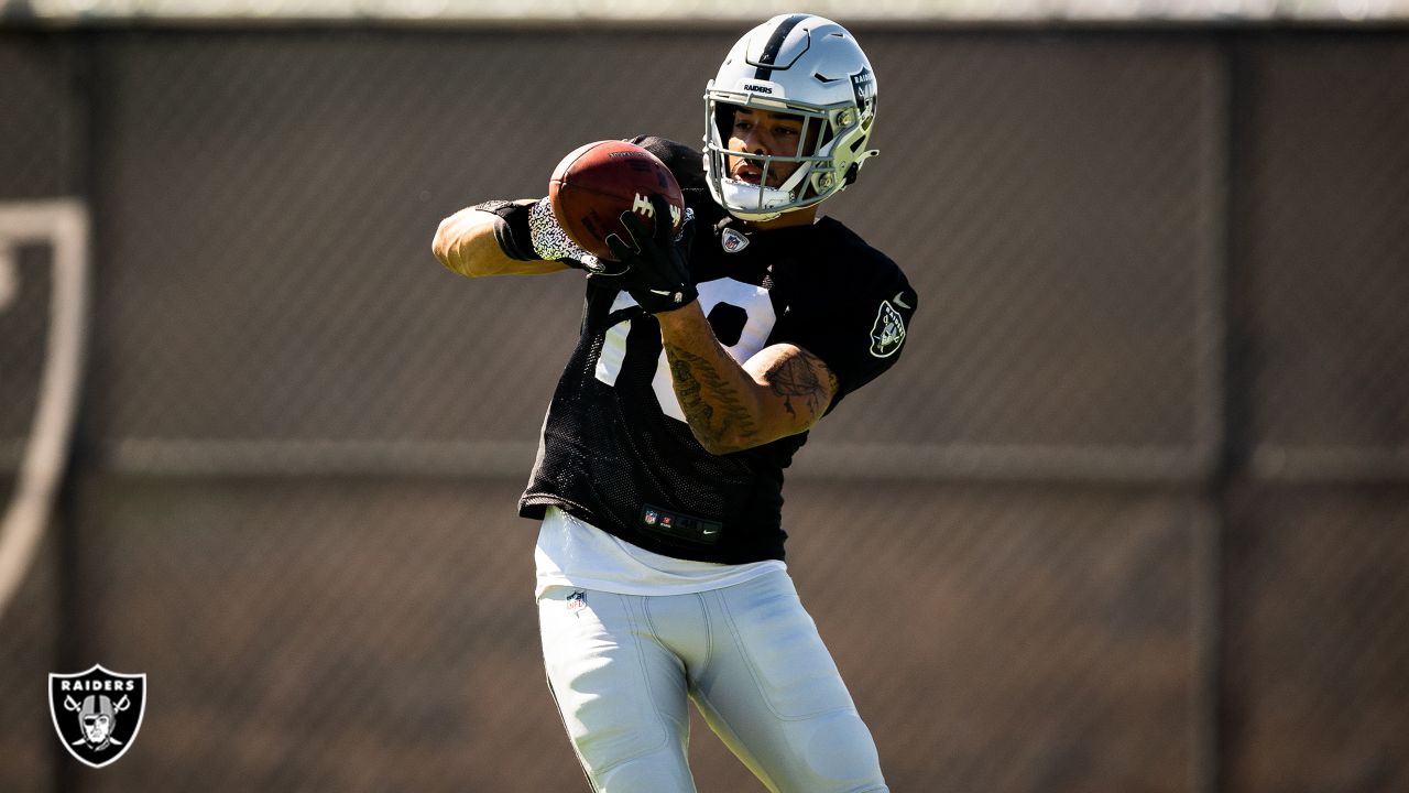 Las Vegas Raiders wide receiver Zay Jones #12 celebrates with running back  Jalen Richard #30, quarterback Derek Carr #4, wide receivers Hunter Renfrow  #13 and Nelson Agholor #15 after scoring a touch