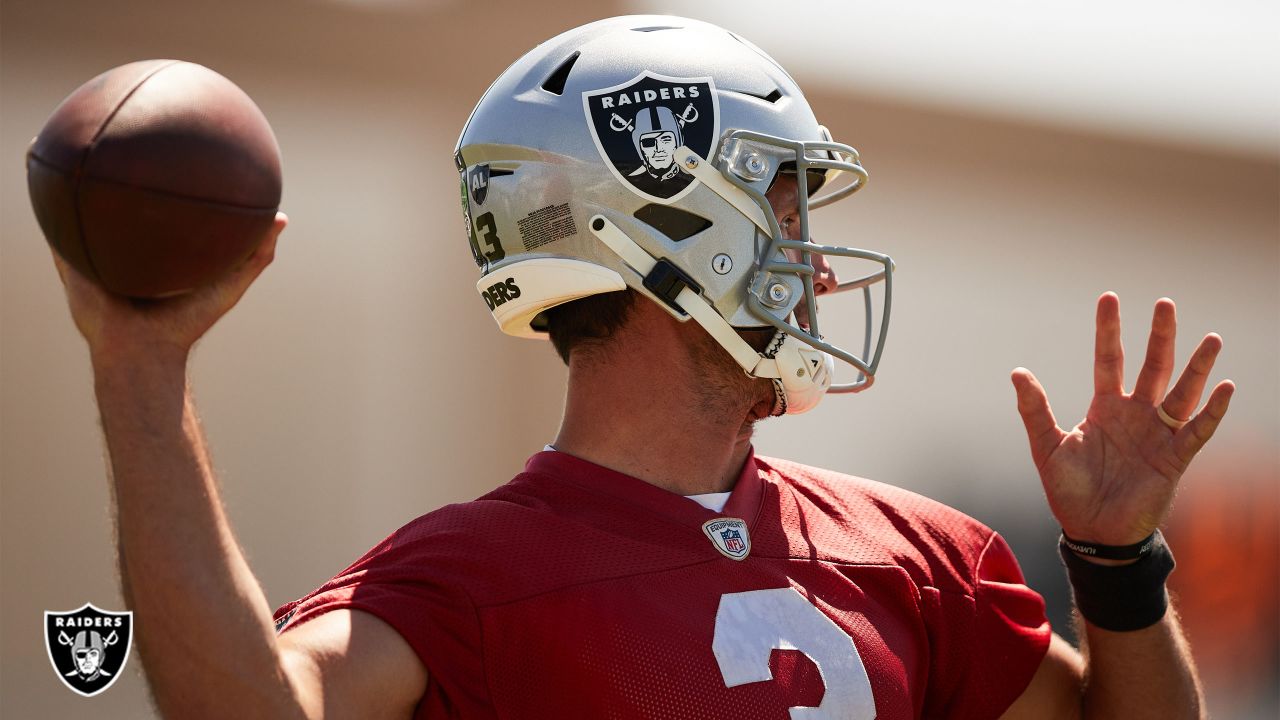 Oakland Raiders quarterback Nathan Peterman (3) throws as Green Bay  Packers' Markus Jones (59) …