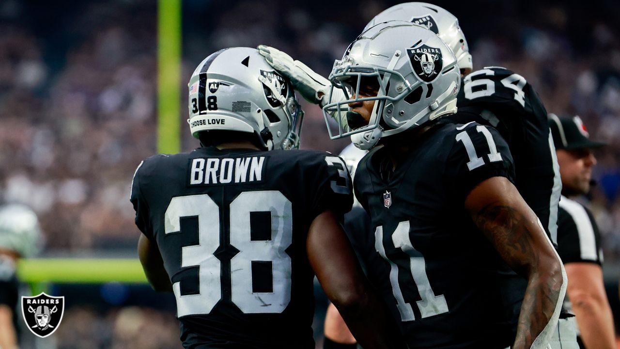 Las Vegas Raiders quarterback Jarrett Stidham is tackled by Minnesota  Vikings defensive tackle T.Y. McGill during the first half of an NFL  preseason football game, Sunday, Aug. 14, 2022, in Las Vegas. (