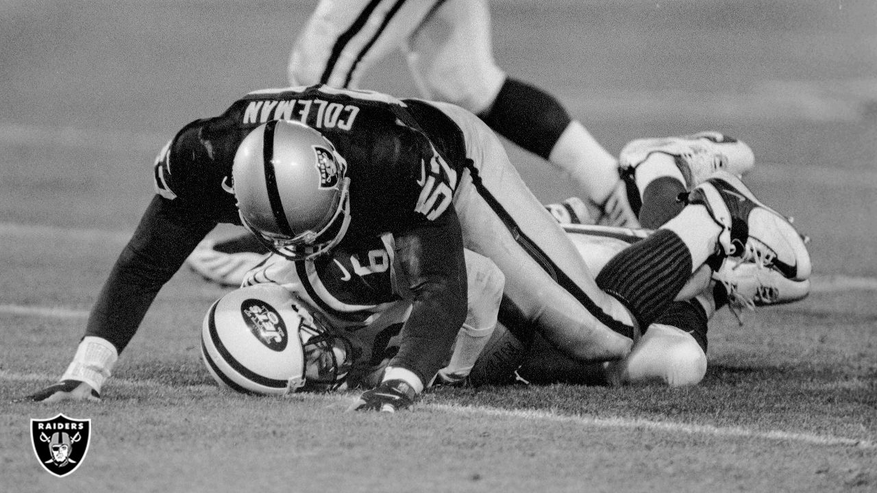 Dec 02, 2002; Oakland, CA, USA; Oakland Raiders' Charles Woodson, tackles  #28 Curtis Martin of the New York Jets'in the 4th quarter of their game on  Monday, December 2, 2002 at Network