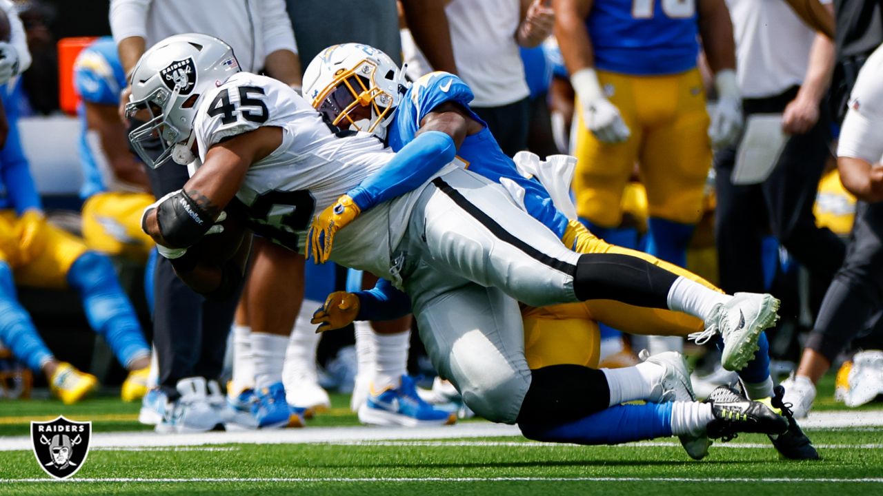 Las Vegas Raiders defensive tackle Bilal Nichols (91) reacts after a  touchdown against the Los Angeles Chargers during the first half of an NFL  football game, Sunday, Dec. 4, 2022, in Las