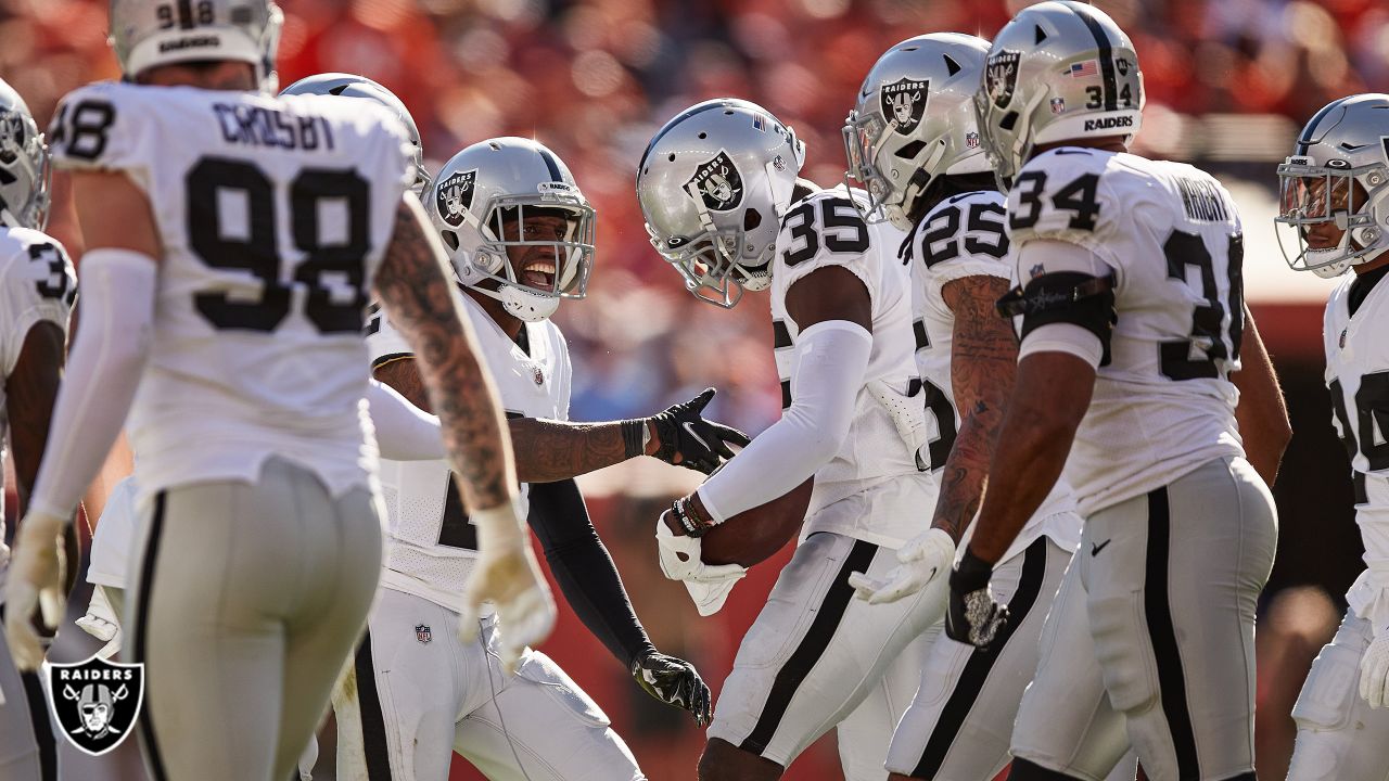 Raiders safety Roderic Teamer (33) and Raiders cornerback Brandon Facyson  (35) celebrate a stop …