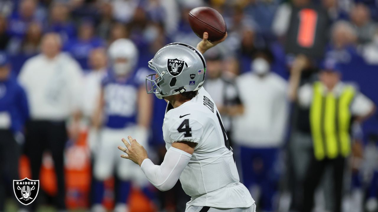 Las Vegas Raiders wide receiver Hunter Renfrow #13 is helped off the field  after suffering a bi …