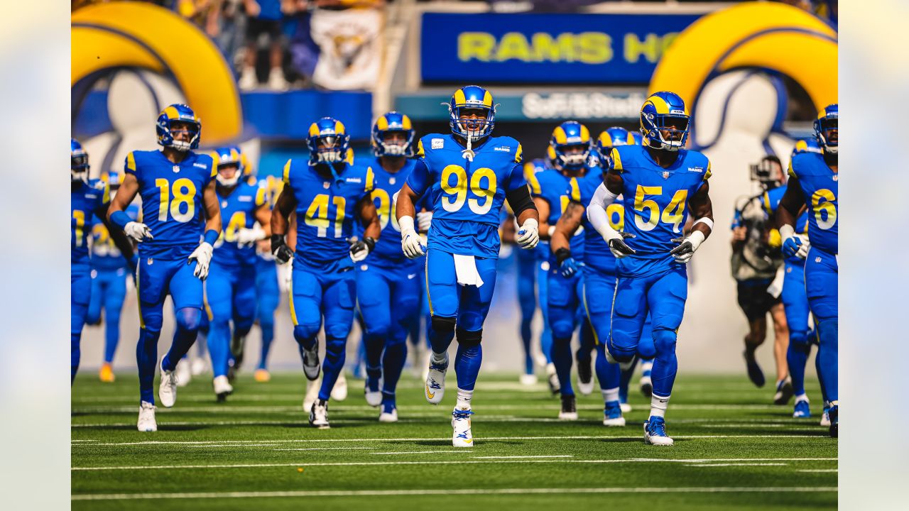 Los Angeles Rams defensive tackle Aaron Donald (99) walks off the field  after a play during the second half of an NFL football game against the Detroit  Lions in Detroit, Michigan USA