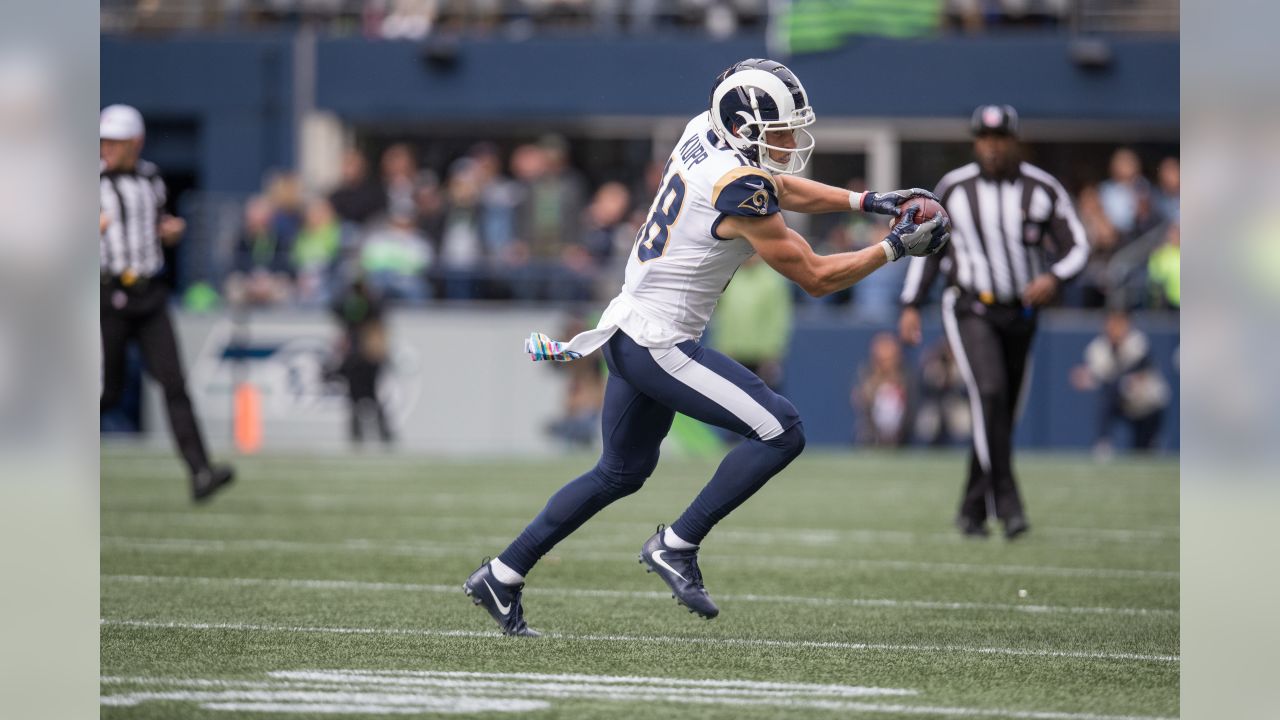 Seattle, WA, USA. 17th Dec, 2017. Los Angeles Rams wide receiver Cooper  Kupp (18) runs with the ball during a game between the Los Angeles Rams and  Seattle Seahawks at CenturyLink Field