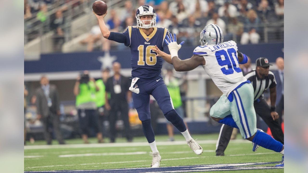 Los Angeles Rams quarterback Jared Goff (16) off balance after being hit  while passing the ball during an NFL football game against the San  Francisco 49ers, Sunday, October 13, 2019 in Los