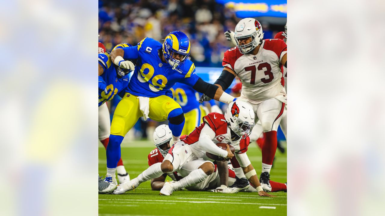 Los Angeles Rams defensive tackle Aaron Donald smiles on the sideline  before a preseason NFL football game against the Los Angeles Chargers  Saturday, Aug. 12, 2023, in Inglewood, Calif. (AP Photo/Ryan Sun