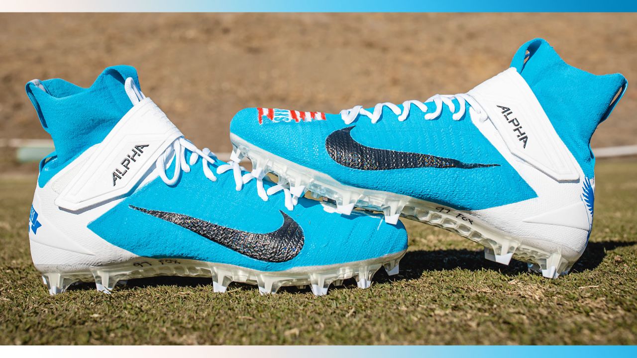 Los Angeles Rams Nike cleats on the sidelines during an NFL Wild