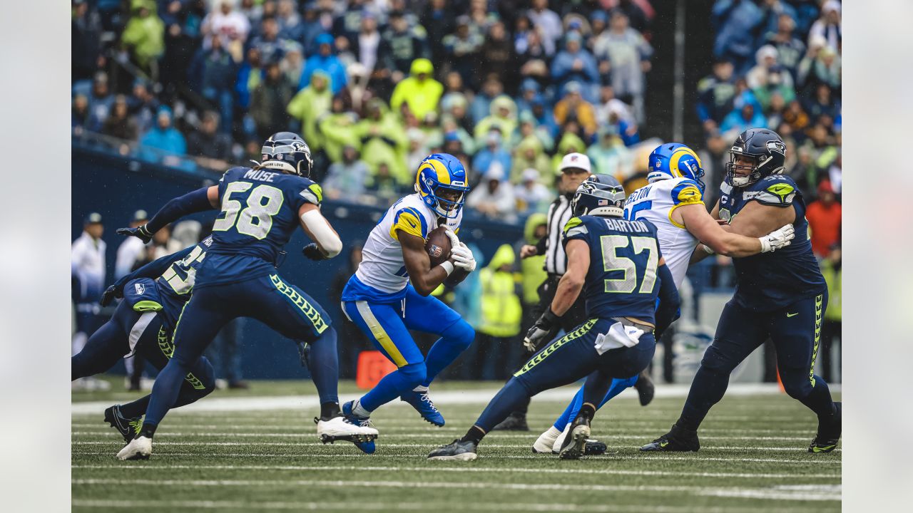 Cleats and socks from the Seattle Seahawks color rush uniform are shown  before an NFL football game against the Los Angeles Rams, Thursday, Dec.  15, 2016, in Seattle. (AP Photo/Scott Eklund Stock