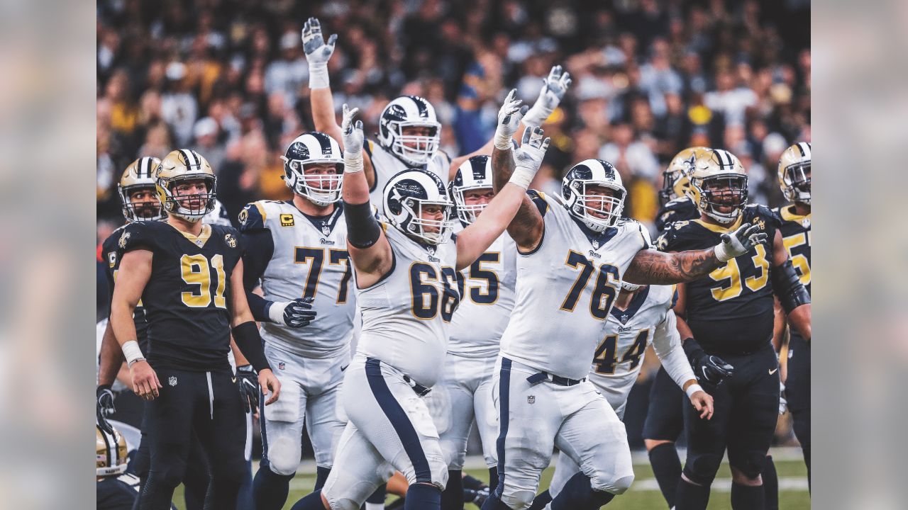 Los Angeles Rams celebrate after overtime of the NFL football NFC