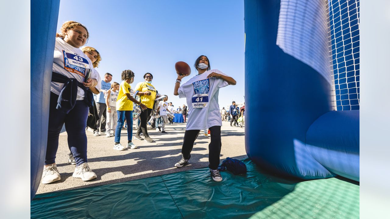 Los Angeles Rams Community Event Recap  Rams Legend Andrew Whitworth, COO  Kevin Demoff, Rams organization & fans take part in WalkUnitedLA 2022