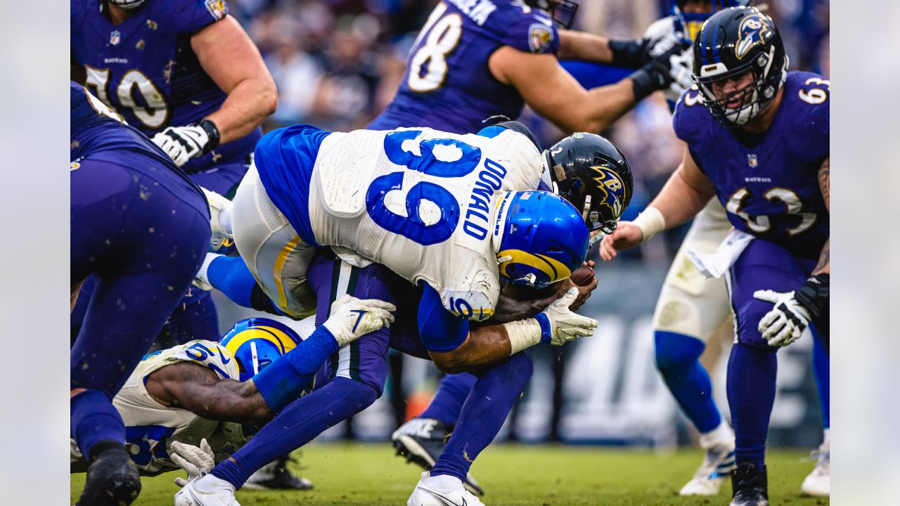 Los Angeles Rams defensive tackle Aaron Donald smiles on the sideline  before a preseason NFL football game against the Los Angeles Chargers  Saturday, Aug. 12, 2023, in Inglewood, Calif. (AP Photo/Ryan Sun