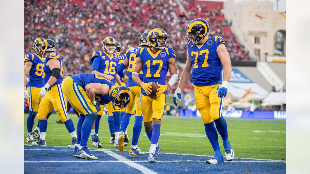 Los Angeles Rams offensive lineman Andrew Whitworth holds up the Vince  Lombardi Super Bowl trophy during the team's victory parade in Los Angeles,  Wednesday, Feb. 16, 2022, following their win Sunday over