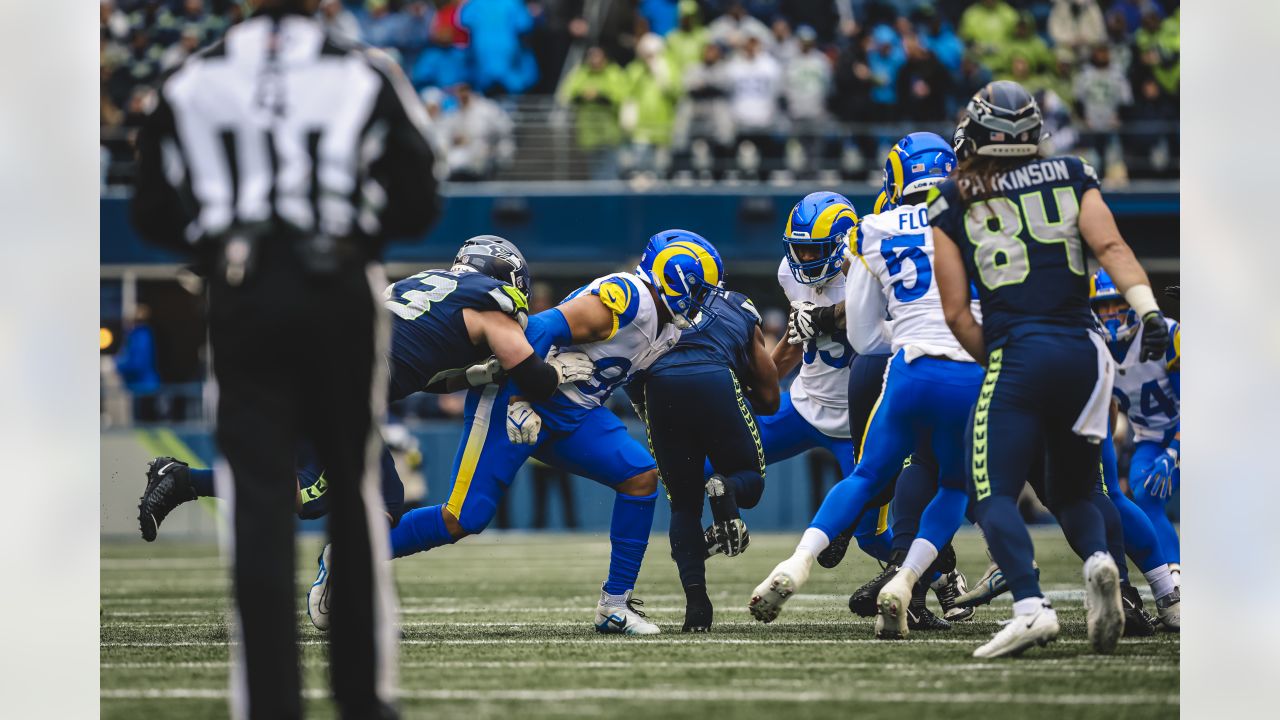 Cleats and socks from the Seattle Seahawks color rush uniform are shown  before an NFL football game against the Los Angeles Rams, Thursday, Dec.  15, 2016, in Seattle. (AP Photo/Scott Eklund Stock