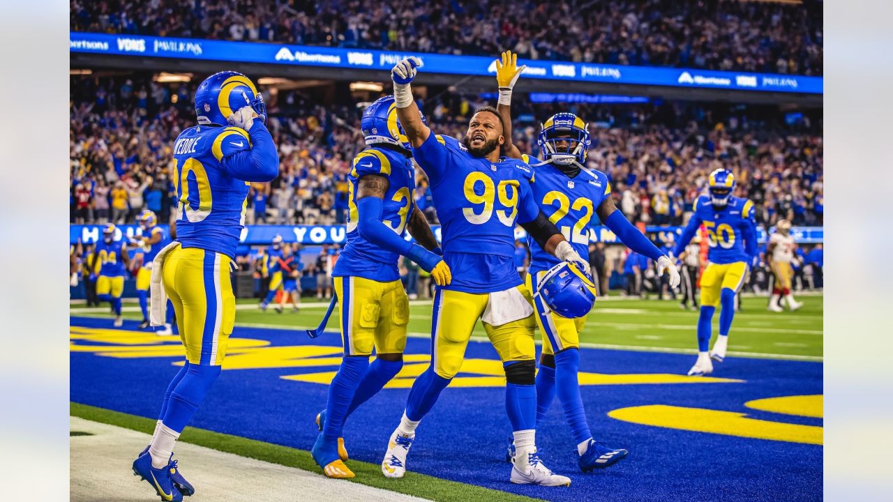 Los Angeles Rams defensive lineman Aaron Donald (99) celebrates his team's  victory over the San …