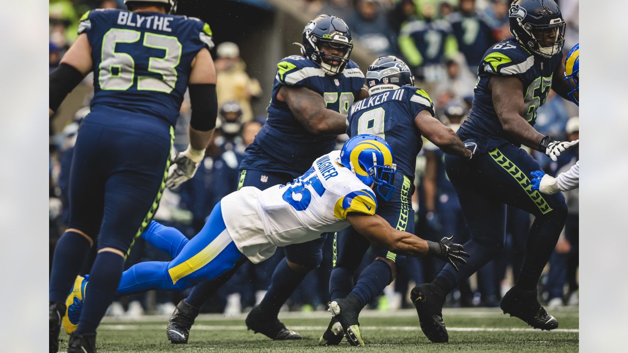 Cleats and socks from the Seattle Seahawks color rush uniform are shown  before an NFL football game against the Los Angeles Rams, Thursday, Dec.  15, 2016, in Seattle. (AP Photo/Scott Eklund Stock