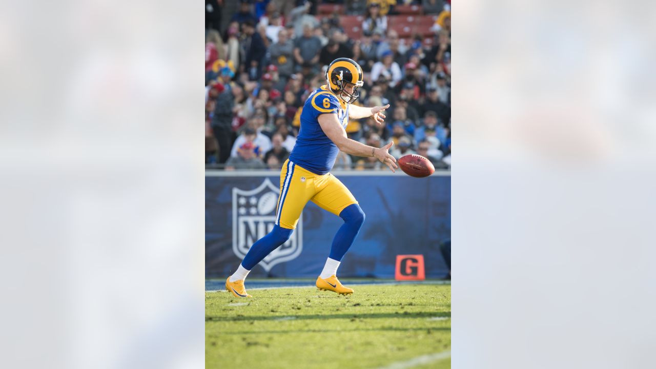 Punter Johnny Hekker of the Los Angeles Rams throws the football