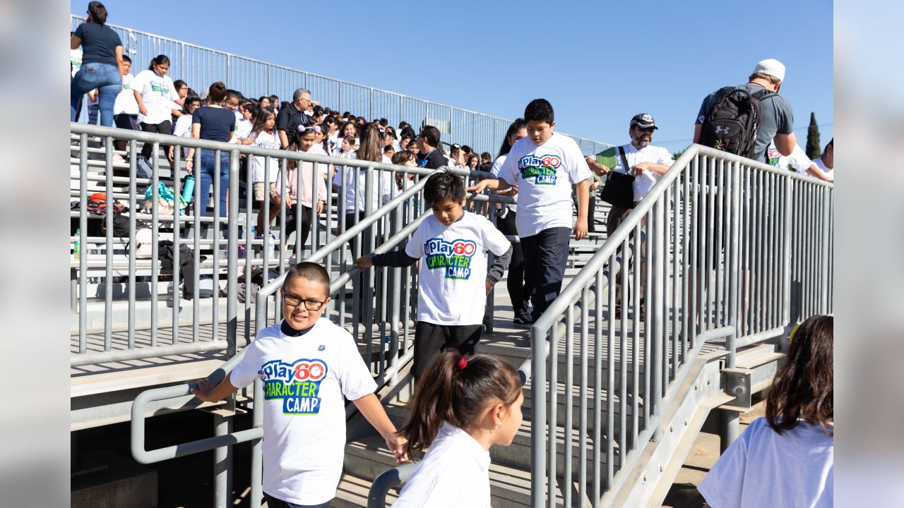 The Los Angeles Rams, in partnership with the NFL, host an NFL PLAY 60 Character Camp at Roosevelt High School in Los Angeles, CA. The Rams will host approximately 300 Hispanic youth, ages 9-13, with little or no football experience for the free camp joined by Rams Cheerleaders and Rampage. Tuesday, September 18, 2018. (Will Navarro/Rams)
