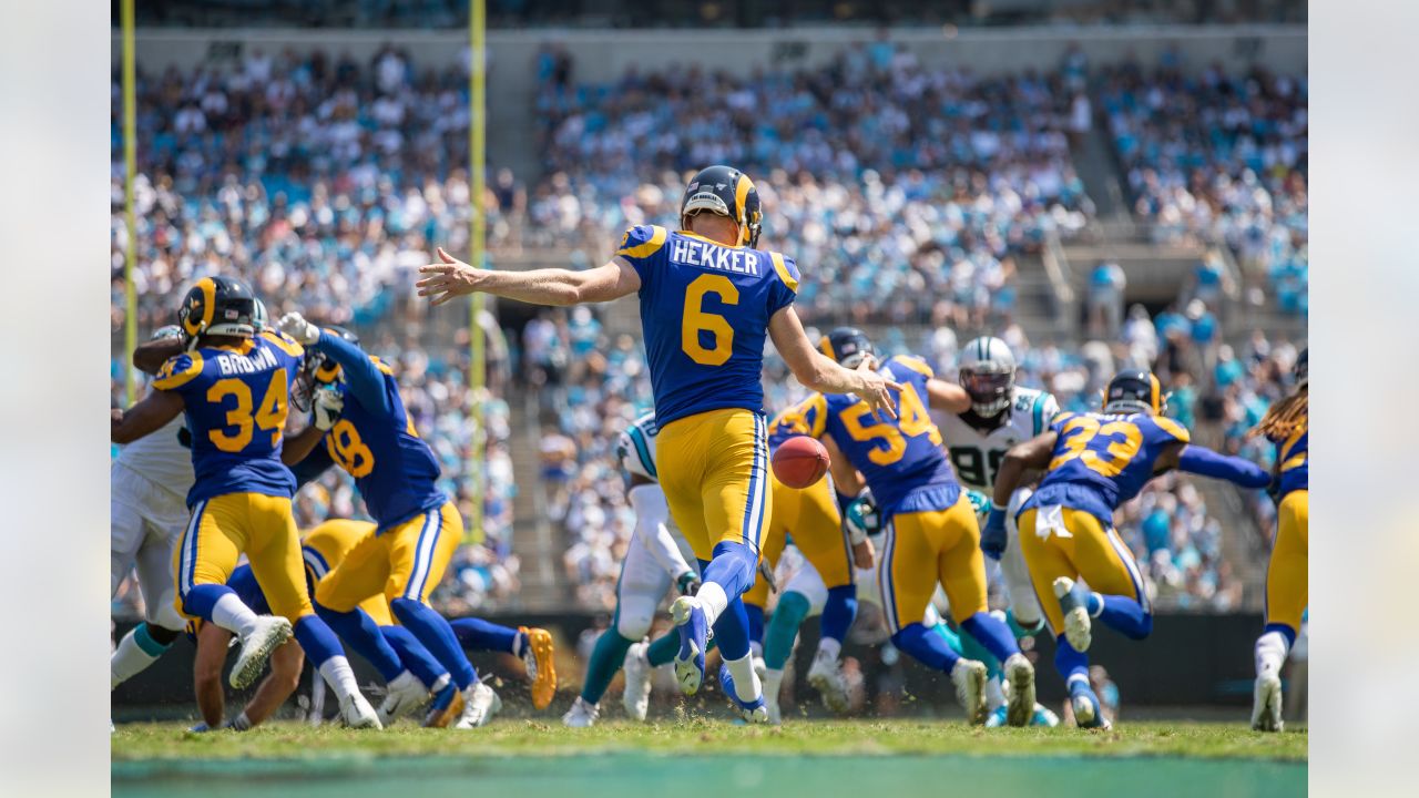 Punter Johnny Hekker of the Los Angeles Rams throws the football