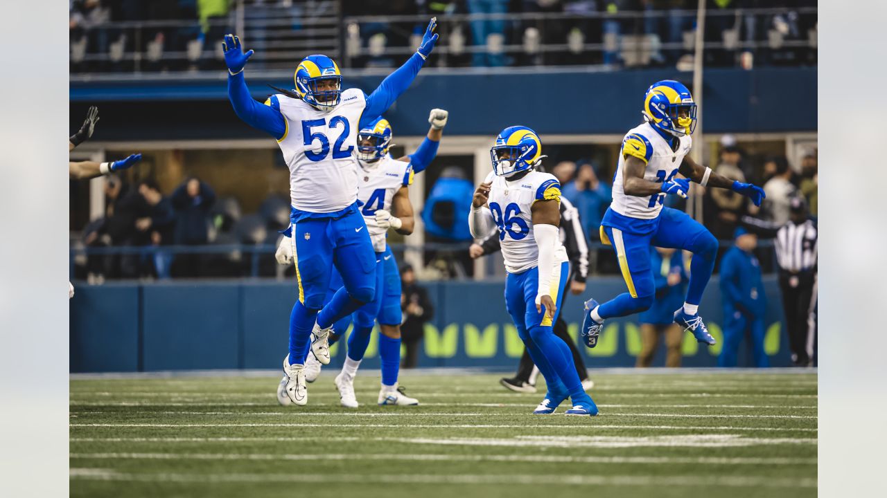 Cleats and socks from the Seattle Seahawks color rush uniform are shown  before an NFL football game against the Los Angeles Rams, Thursday, Dec.  15, 2016, in Seattle. (AP Photo/Scott Eklund Stock