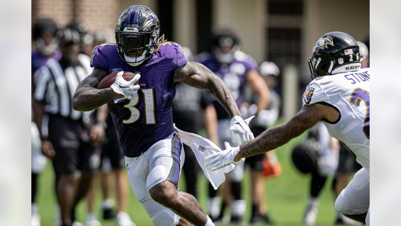 Baltimore Ravens wide receiver Devin Duvernay (13) returns a kick during an  NFL football game against the Tampa Bay Buccaneers, Thursday, Oct. 27, 2022  in Tampa, Fla. The Ravens defeat the Buccaneers