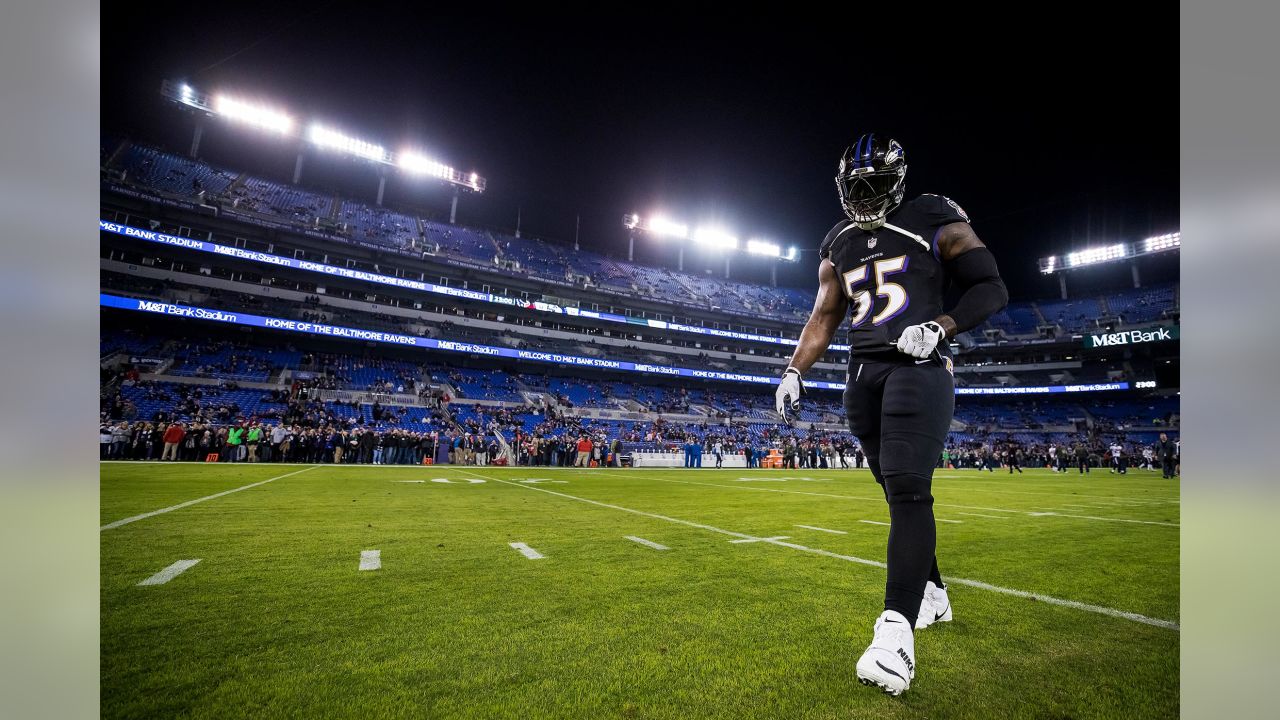 Baltimore linebackers Ray Lewis (52) and Peter Boulware (58) walk