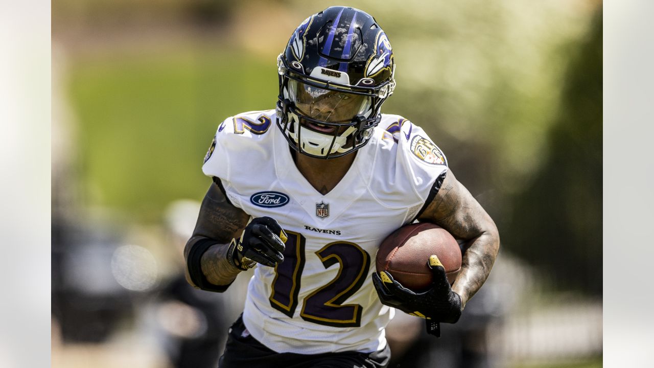 Baltimore Ravens wide receiver Rashod Bateman (12) runs a play during an  NFL football game against the Miami Dolphins, Thursday Nov. 11, 2021, in  Miami Gardens, Fla. (AP Photo/Doug Murray Stock Photo - Alamy