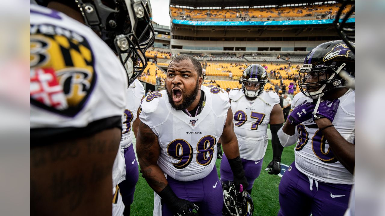 The Pittsburgh Steelers flag corps leads the team on to the field before an  NFL football game against the Baltimore Ravens, Sunday, Dec. 10, 2017, in  Pittsburgh. (AP Photo/Keith Srakocic Stock Photo 