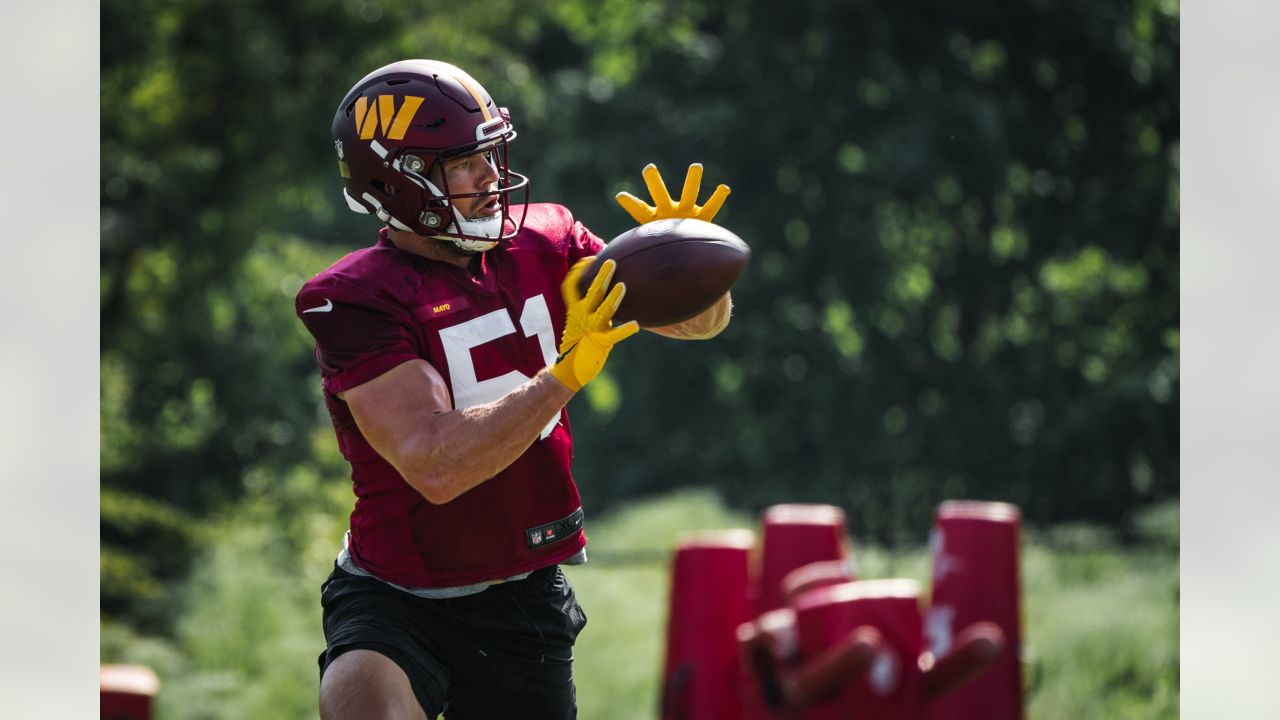 Washington Commanders tight end John Bates runs a route during the second  half of an NFL preseason football game between the Washington Commanders  and the Baltimore Ravens, Monday, Aug. 21, 2023, in