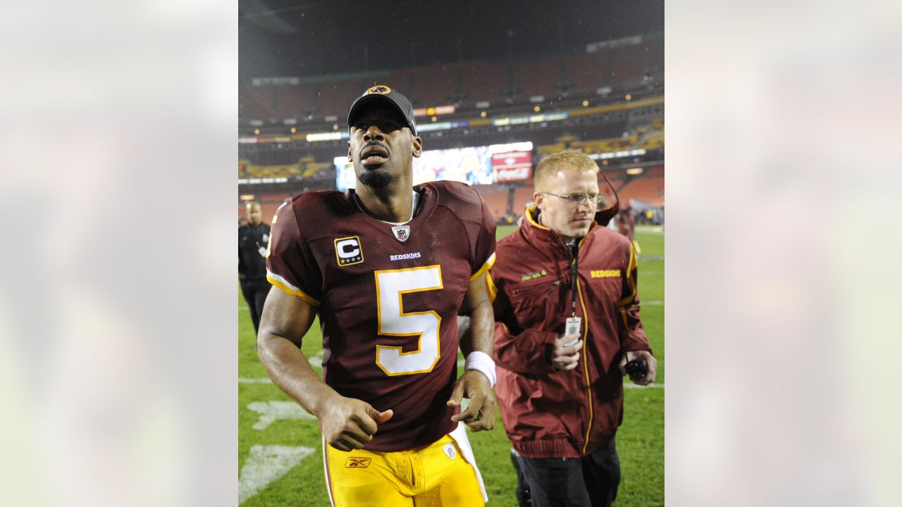 Philadelphia Eagles quarterback Donovan McNabb (5) rolls out in