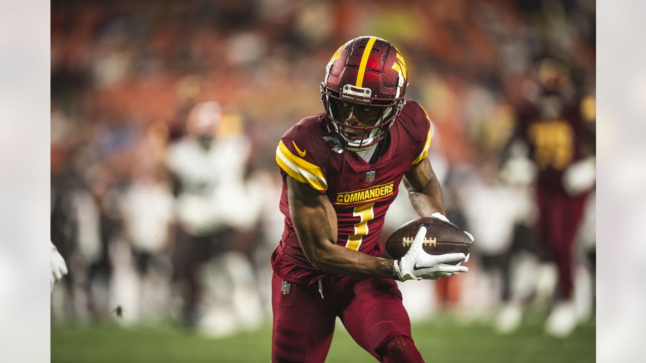 Washington Commanders wide receiver Jahan Dotson (1) runs up the field  during an NFL pre-season football game against the Cleveland Browns,  Friday, Aug. 11, 2023, in Cleveland. (AP Photo/Kirk Irwin Stock Photo 