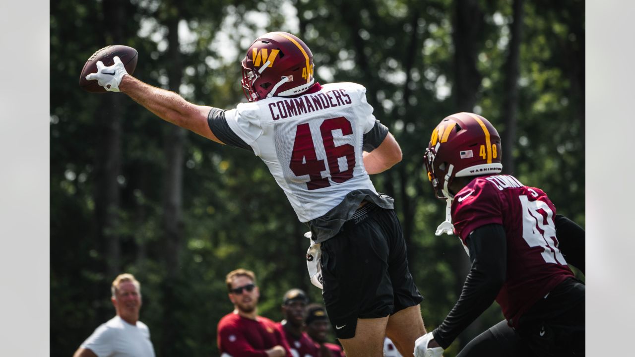 Washington Commanders tight end Armani Rogers (88) wears Crucial