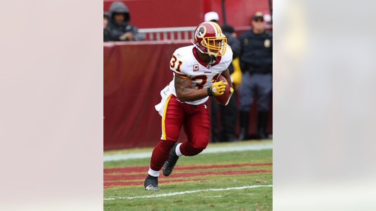 Washington Redskins Rock Cartwright (31) is tackled by New York