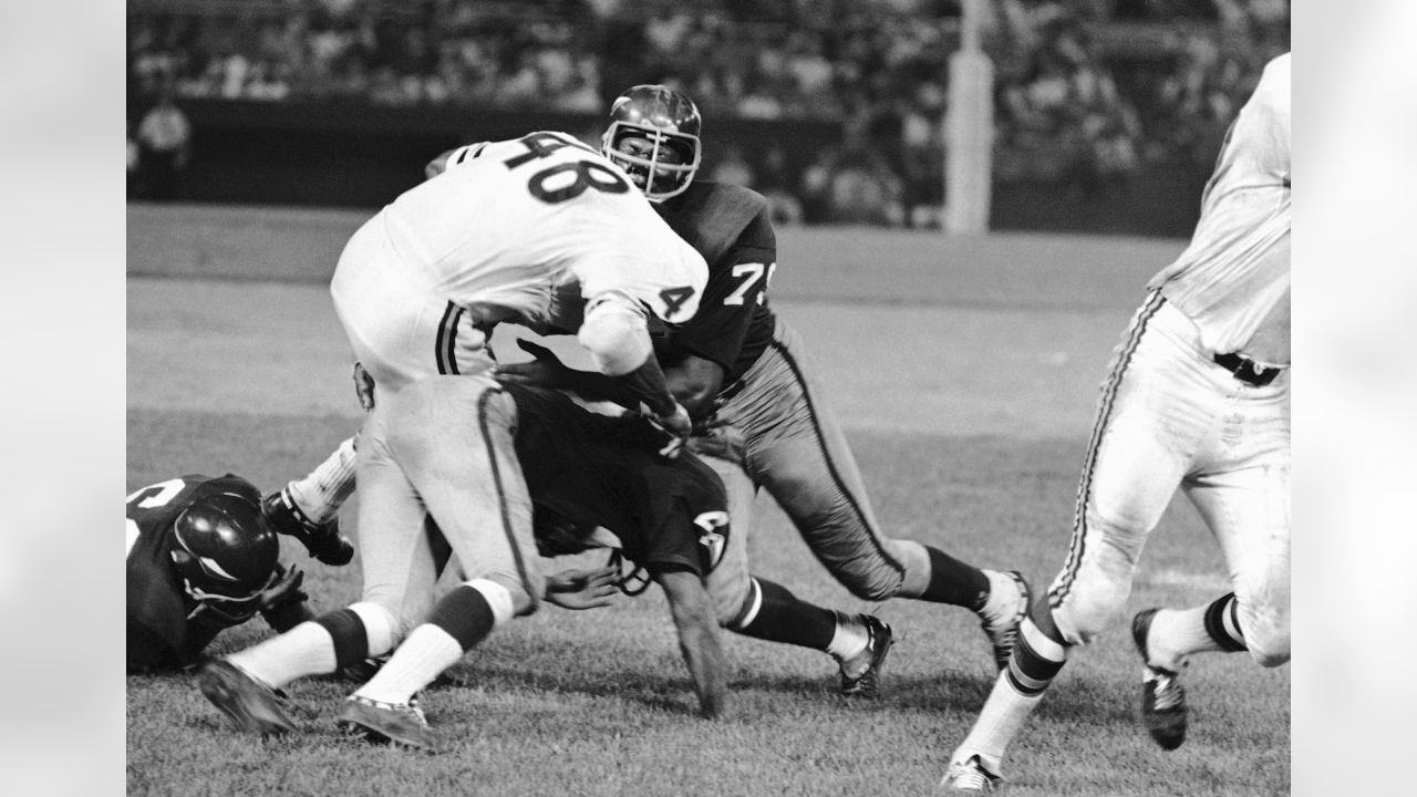 Washington Redskins rookie, John Love, in action in NFL exhibition game  with the Chicago Bears on August 9, 1967 in Washington, is determined to  make the team. In Washington's 37-14 victory, Love