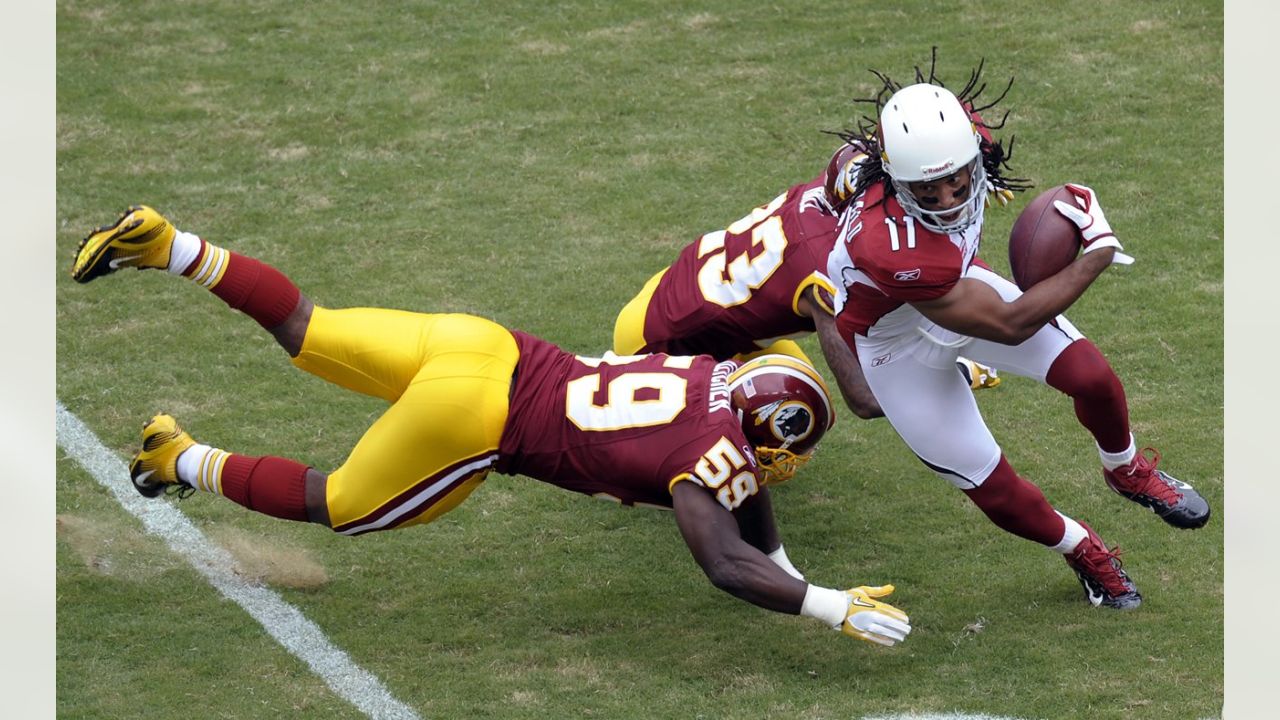 Washington Redskins Stephen Bowen celebrates with Barry Cofield