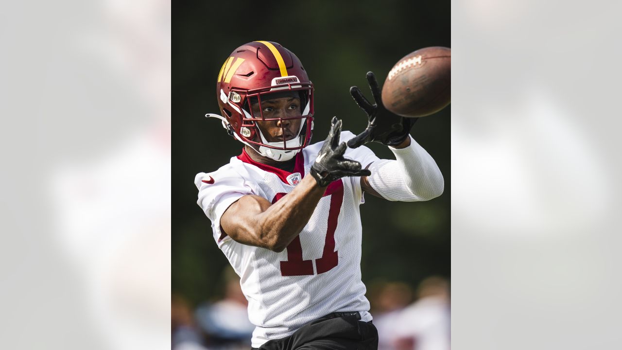 Washington Commanders wide receiver Byron Pringle runs with the ball during  a NFL football practice at the team's training facility, Saturday, July 29,  2023, in Ashburn, Va. (AP Photo/Stephanie Scarbrough Stock Photo 