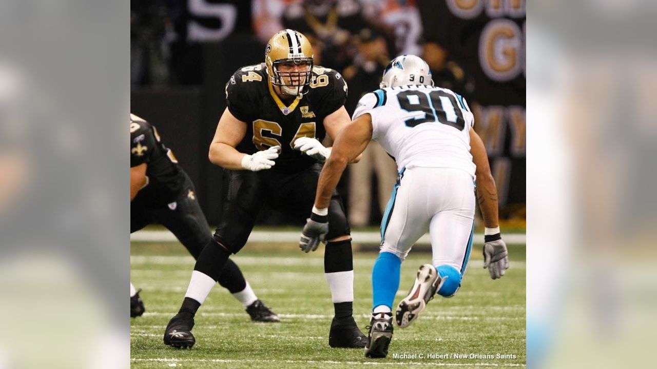 New Orleans Saints tackle Zach Strief, right, looks into the rushing  defense as he protects the quarterback during practice Monday afternoon,  Aug. 7, 2006, at the team's training camp at Millsaps College