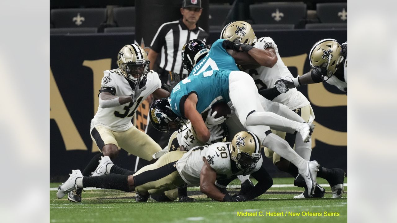 Arizona Cardinals' Leki Fotu (76) and New Orleans Saints' Chase