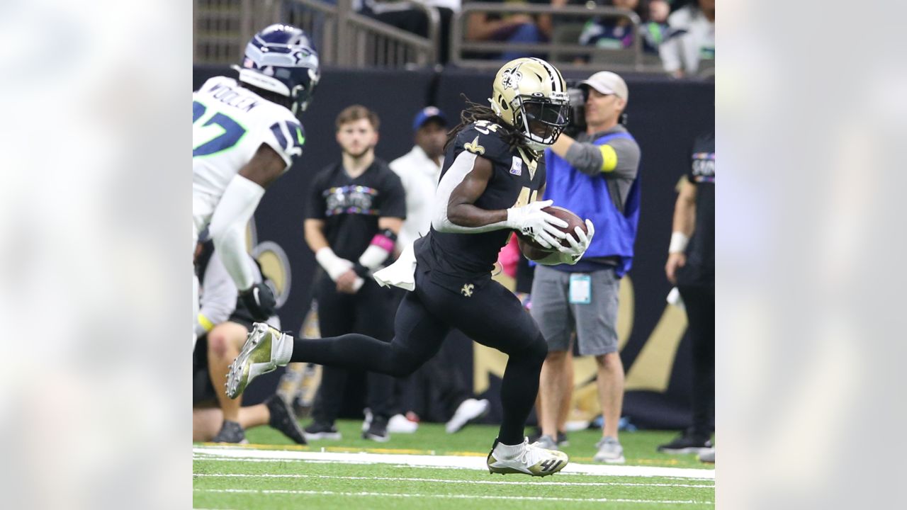 New Orleans Saints defensive end Cameron Jordan (94) celebrates after a  play during an NFL football game against the Seattle Seahawks, Sunday, Oct.  9, 2022, in New Orleans. (AP Photo/Tyler Kaufman Stock