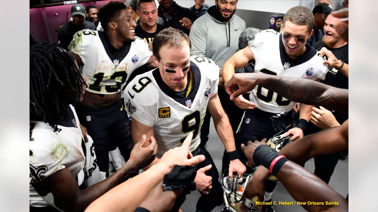 New Orleans Saints quarter back Drew Brees celebrates with his