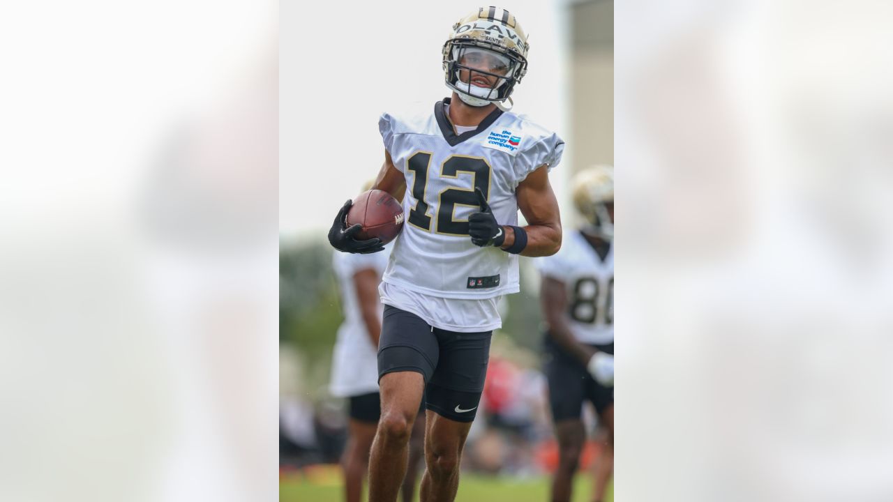 New Orleans Saints offensive tackle Trevor Penning (70) runs through drills  at the NFL team's football training camp in Metairie, La., Wednesday, Aug.  2, 2023. (AP Photo/Gerald Herbert Stock Photo - Alamy