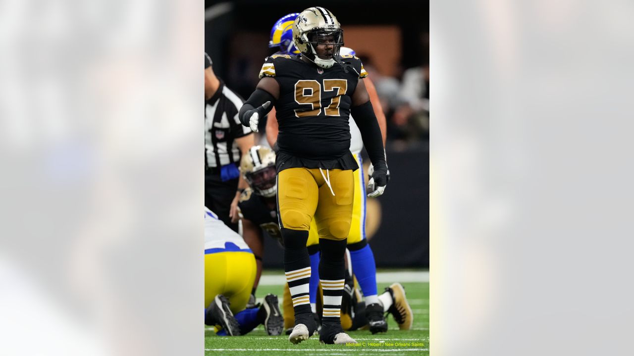 Los Angeles Rams defensive tackle Bobby Brown III (95) warms up before an  NFL football game against the New Orleans Saints, Sunday, Nov. 20, 2022, in  New Orleans. (AP Photo/Tyler Kaufman Stock