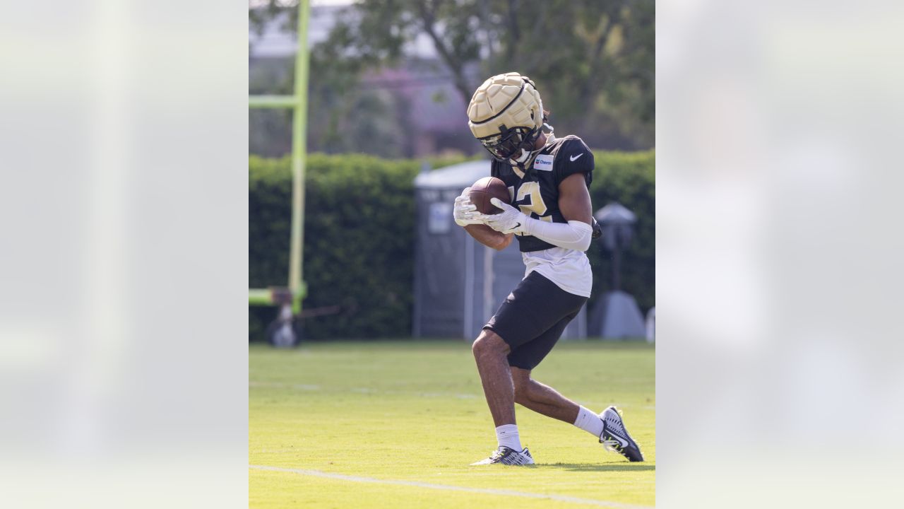 New Orleans Saints safety Smoke Monday (38) runs through drills in practice  during the Back Together Weekend fan appreciation initiative at the NFL  team's football training camp in Metairie, La., Saturday, July