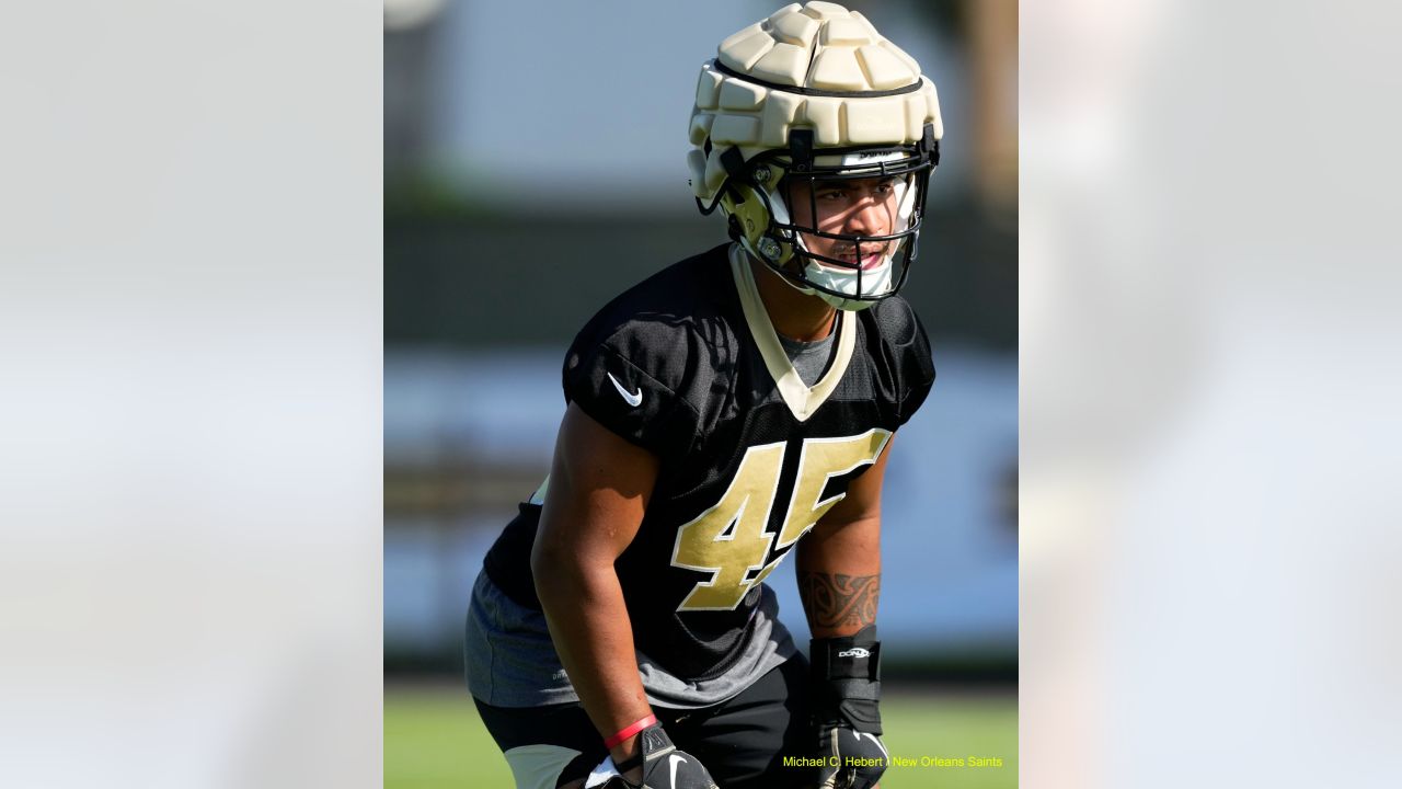 New Orleans Saints linebacker Nephi Sewell (45) signs autographs during the  Back Together Weekend fan appreciation initiative at the NFL team's  football training camp in Metairie, La., Saturday, July 29, 2023. (AP