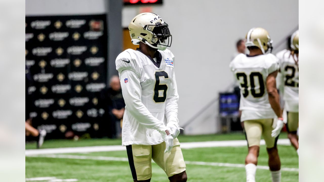 New Orleans Saints wide receiver Deonte Harty (11) wipes sweat from his  brow during training camp